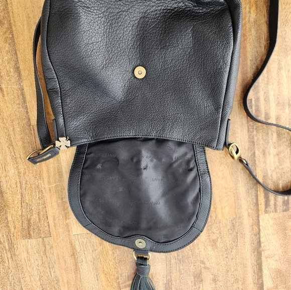 Lucky Brand black leather purse with magnetic tassle closure. It is 10"x10". - Picture 5 of 7